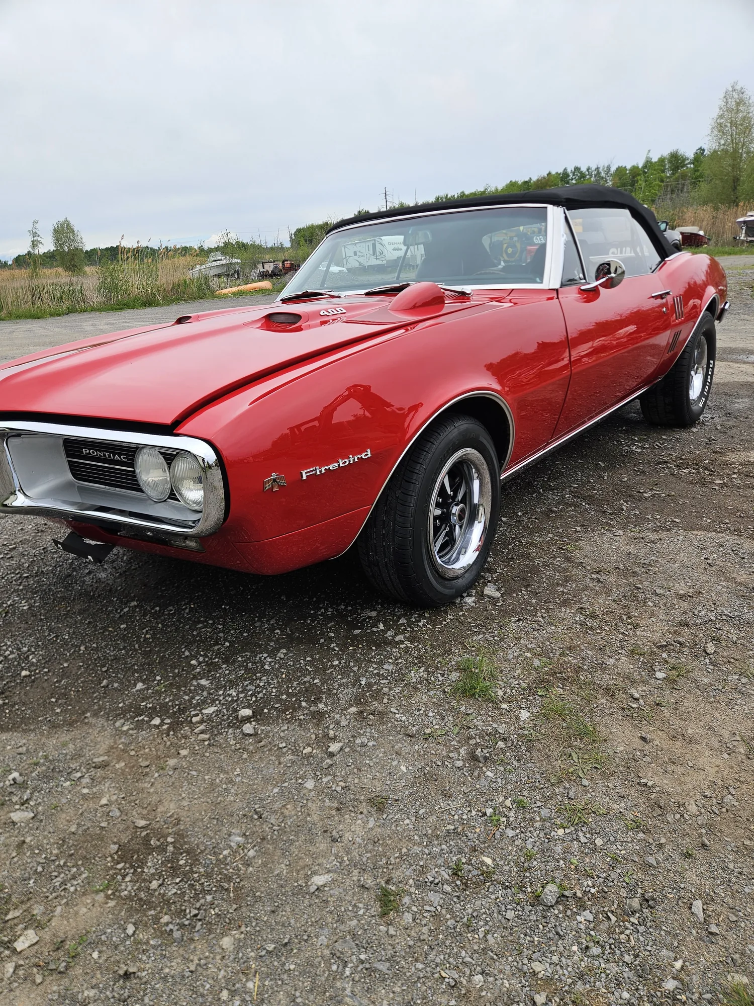 Red Firebird convertible after a detail