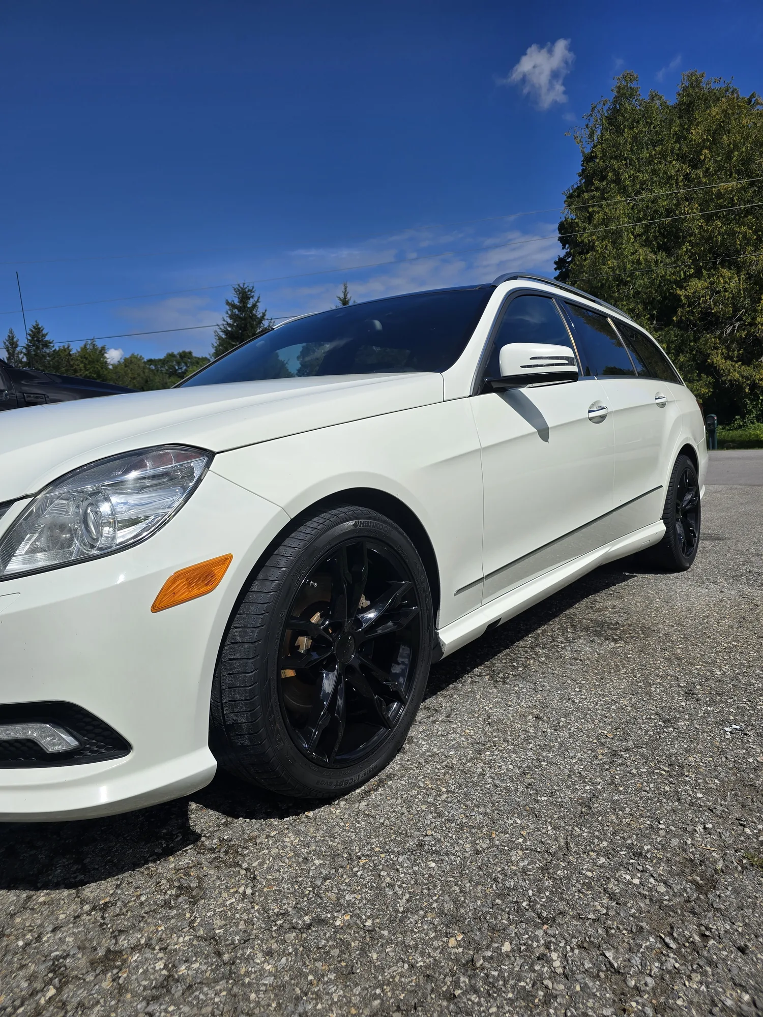 White Mercedes wagon after an exterior detail